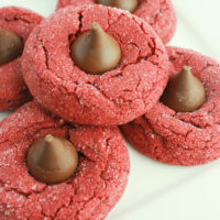 Red Velvet Kiss Cookies Recipe made with a Cake Mix featured by top US cookie blog, Practically Homemade