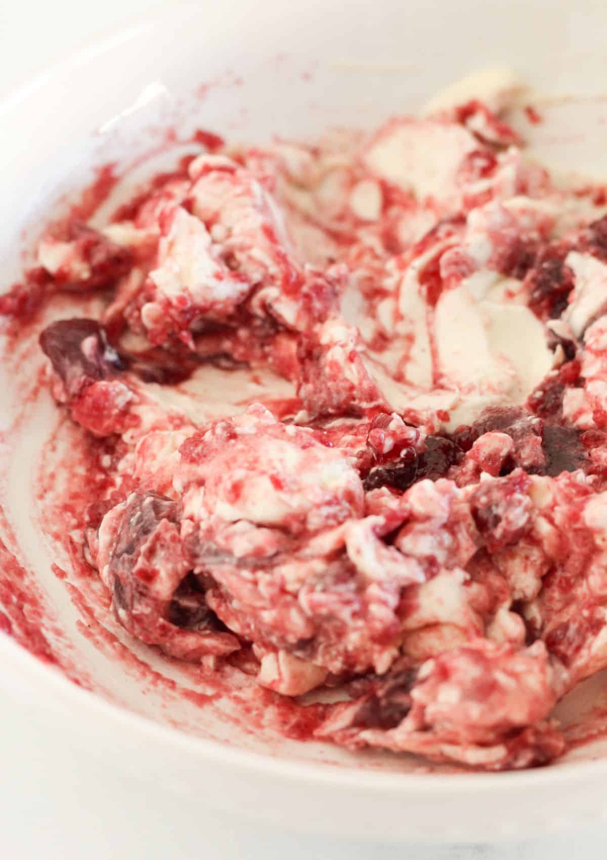 Combining the cream cheese, cranberry sauce and mayo.