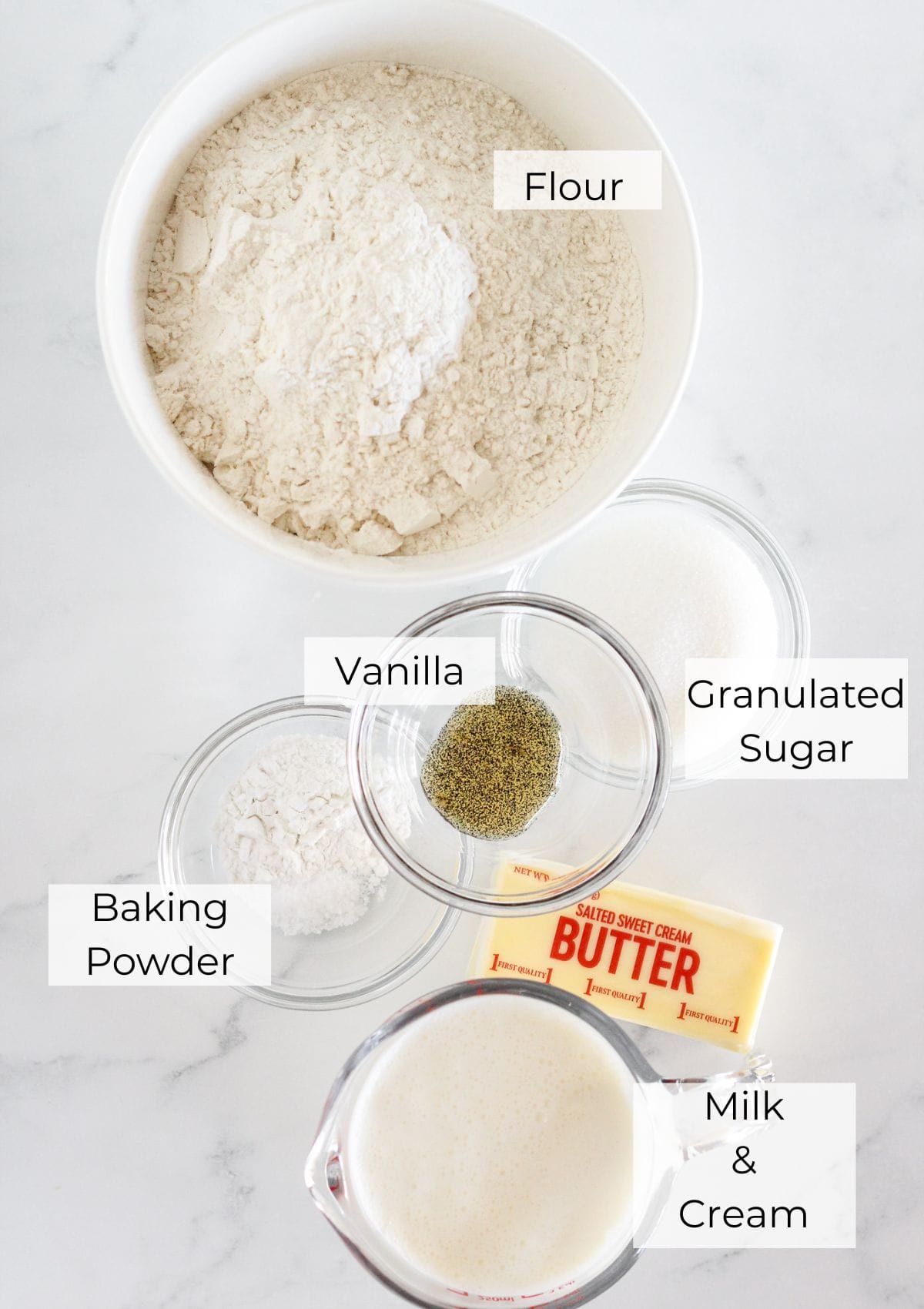 The ingredients needed to make strawberry shortcake biscuits that are sweet.