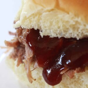 Crock Pot Pulled Pork Recipe featured by top US food blog, Practically Homemade