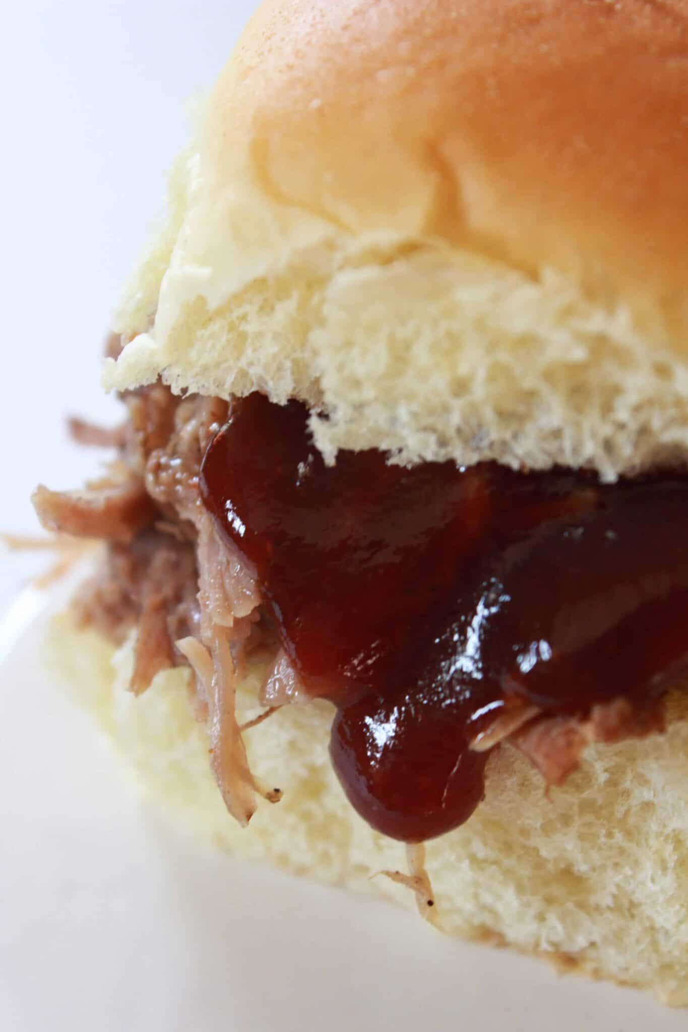 Crock Pot Pulled Pork Recipe featured by top US food blog, Practically Homemade