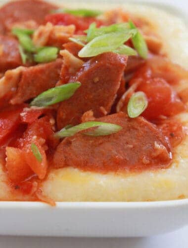 15 Minute Andouille Sausage and Grits Recipe featured by top US food blog, Practically Homemade