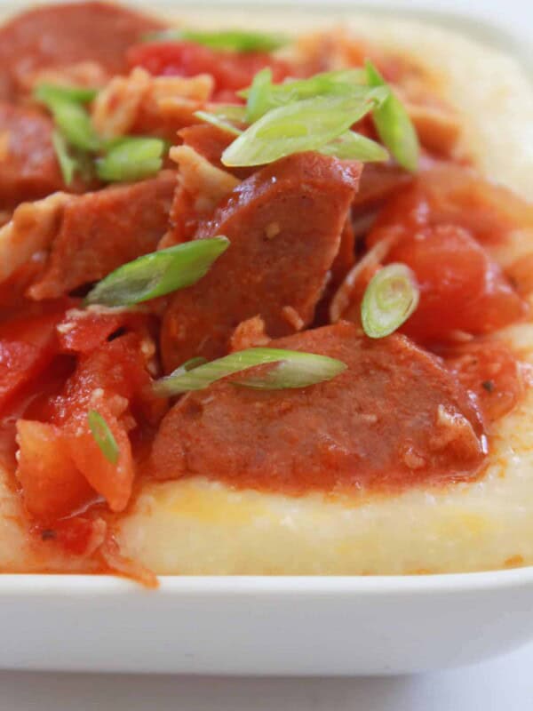 15 Minute Andouille Sausage and Grits Recipe featured by top US food blog, Practically Homemade