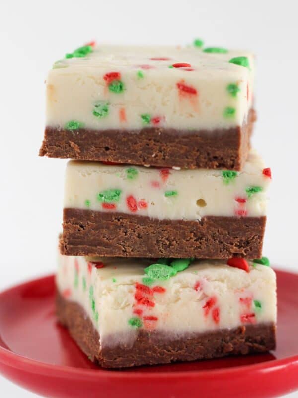 Three pieces of holiday fudge on a tray.