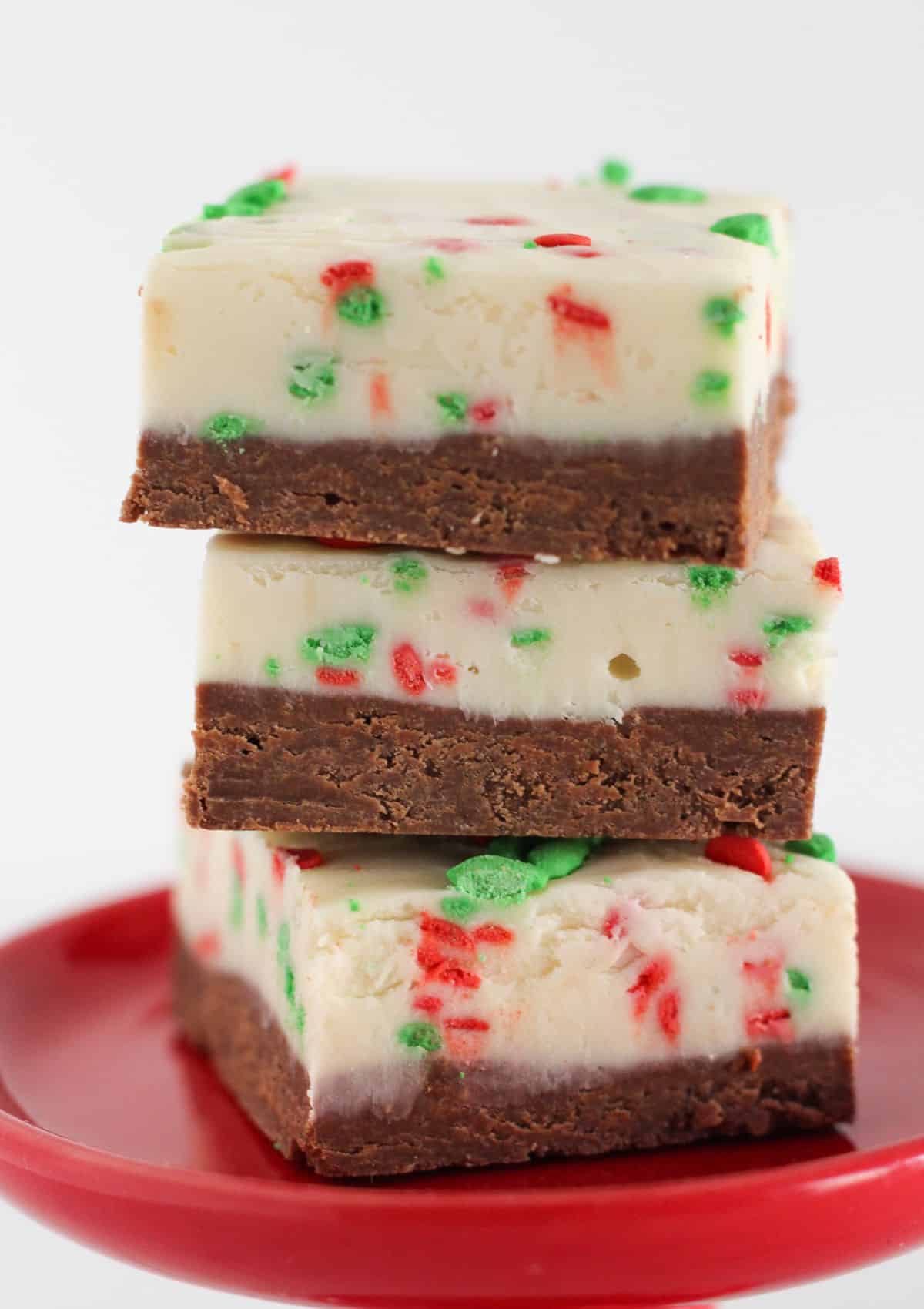 Three pieces of holiday fudge on a tray.