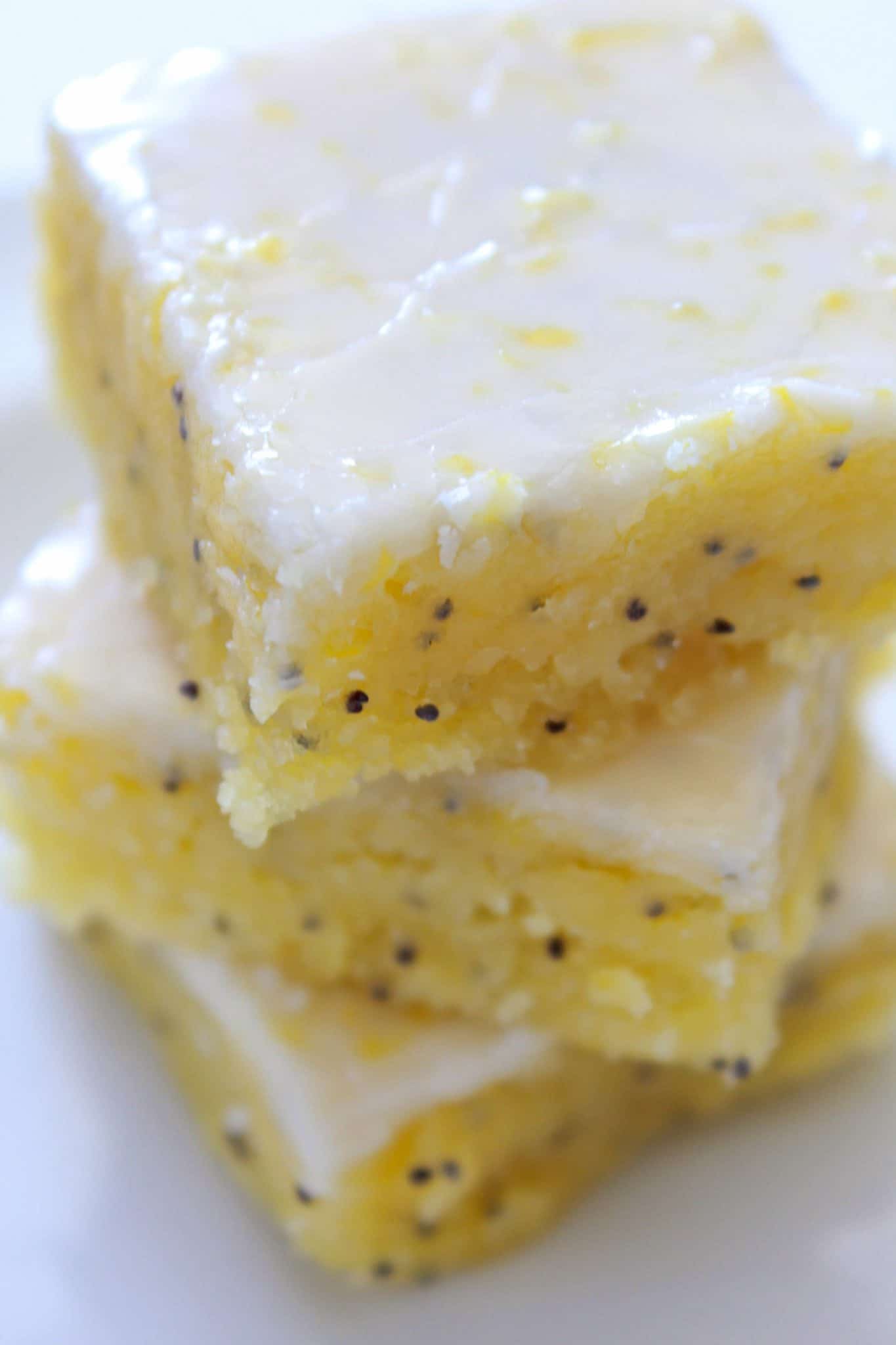 Popular 2019 Recipes featured by top US food blog, Practically Homemade: glazed lemon poppy seed bars