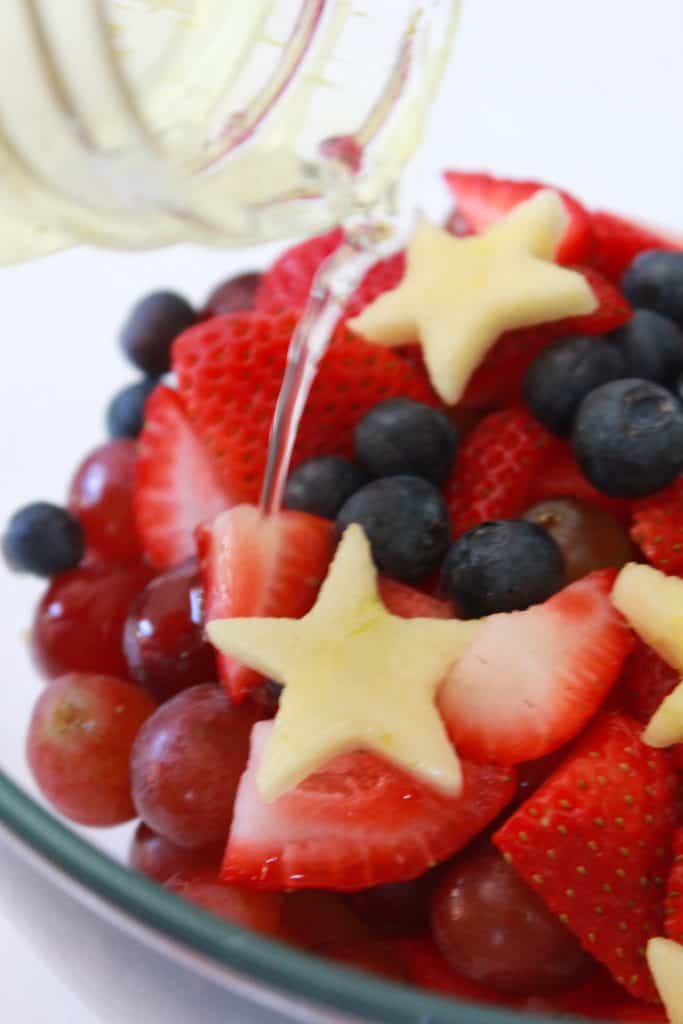 Red White and Blue Fruit Salad for the 4th a July, recipe featured by top US food blog, Practically Homemade