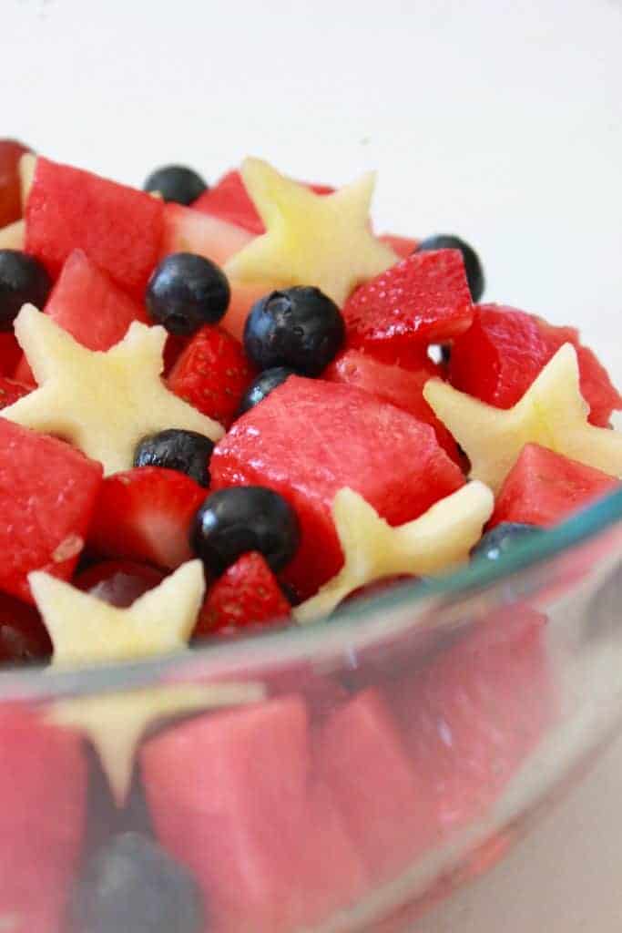 Red White and Blue Fruit Salad for the 4th a July, recipe featured by top US food blog, Practically Homemade