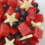 A bowl full of fourth of July fruit salad.