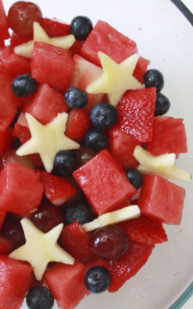 A bowl full of fourth of July fruit salad.