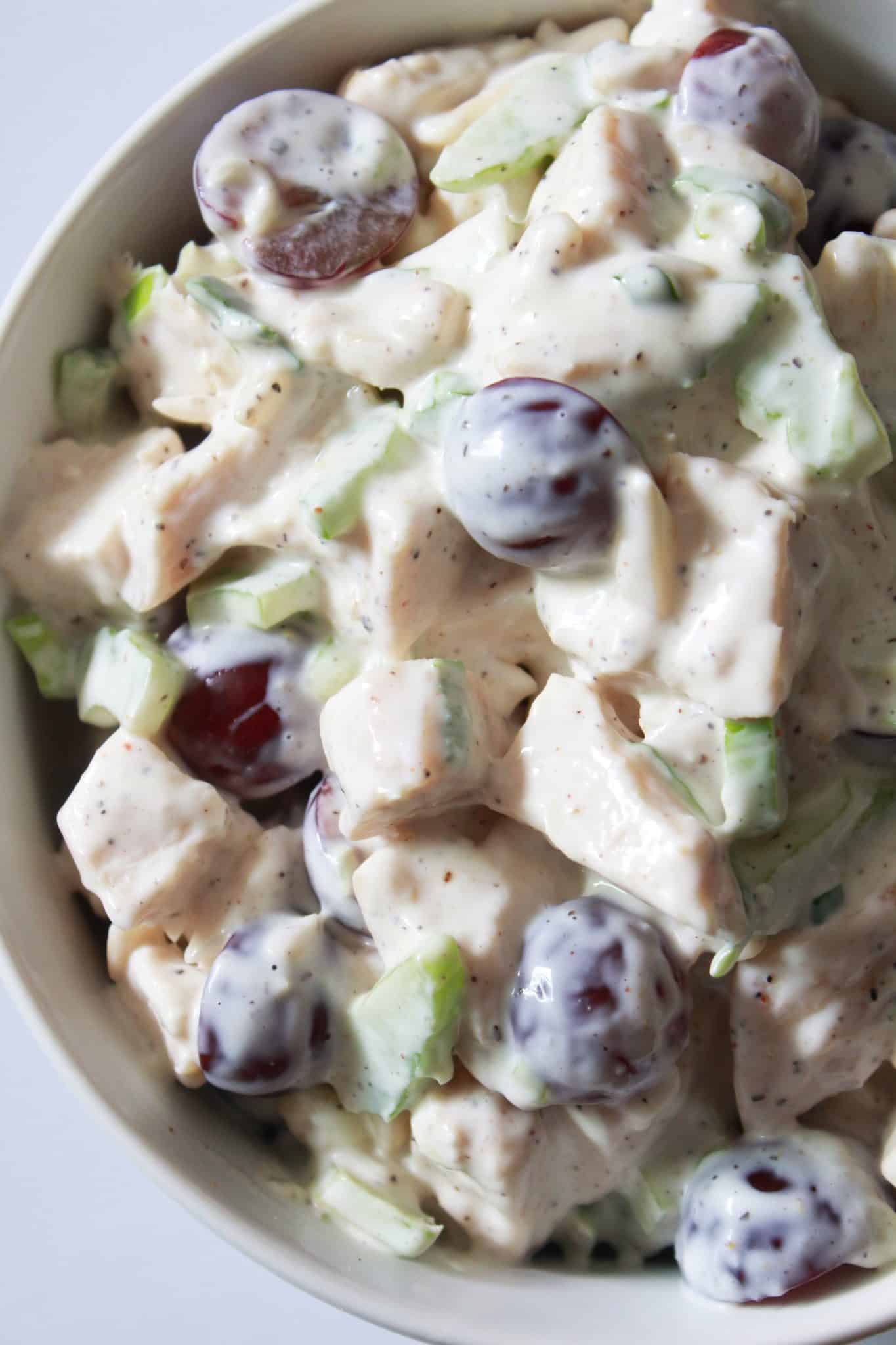 A Quick Summer Chicken Salad with Grapes and Almonds recipe featured by top US food blog, Practically Homemade