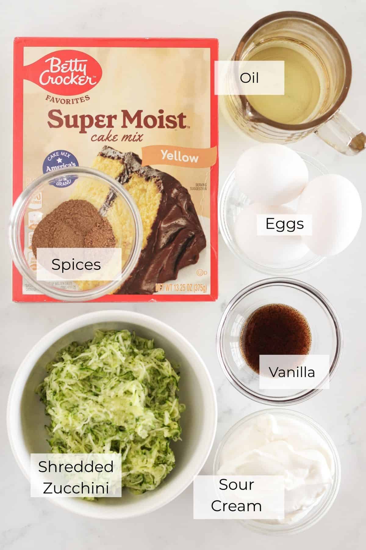 The ingredients needed to make zucchini coffee cake.
