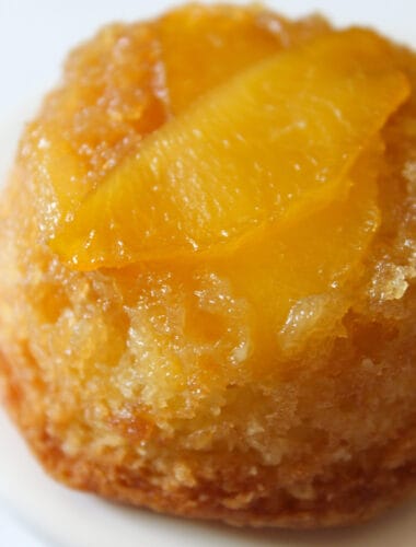 Easy Upside Down Peach Cupcakes featured by top US food blog, Practically Homemade