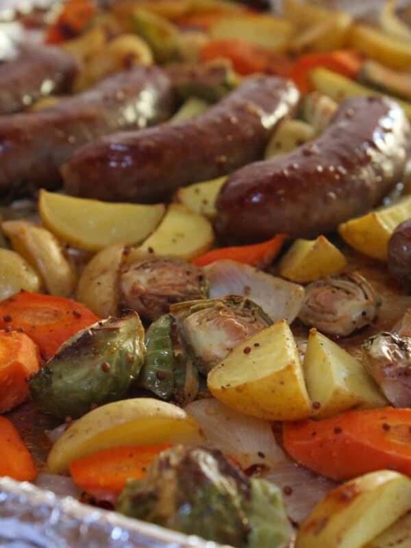 Sheet Pan Brats and Potatoes recipe for Oktoberfest dinner, featured by top US food blog, Practically Homemade
