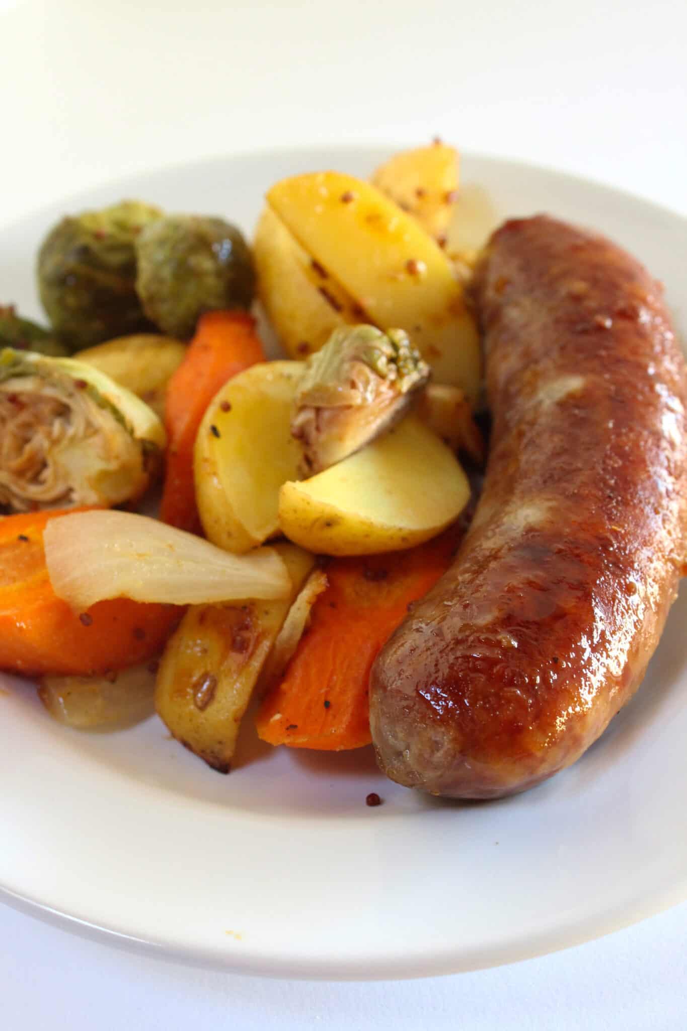 Sheet Pan Brats and Potatoes recipe for Oktoberfest dinner, featured by top US food blog, Practically Homemade