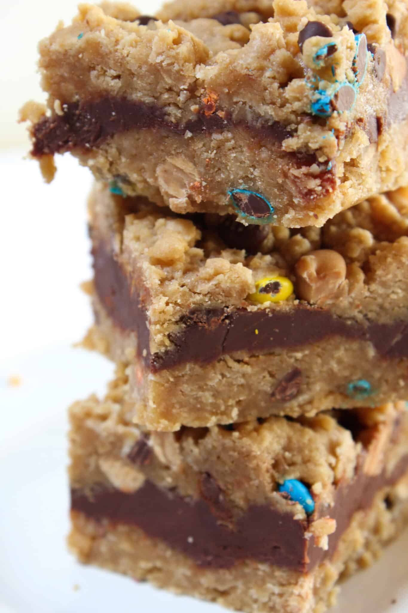 Monster Cookie Oatmeal Fudge Bars Recipe featured by top US food blog, Practically Homemade