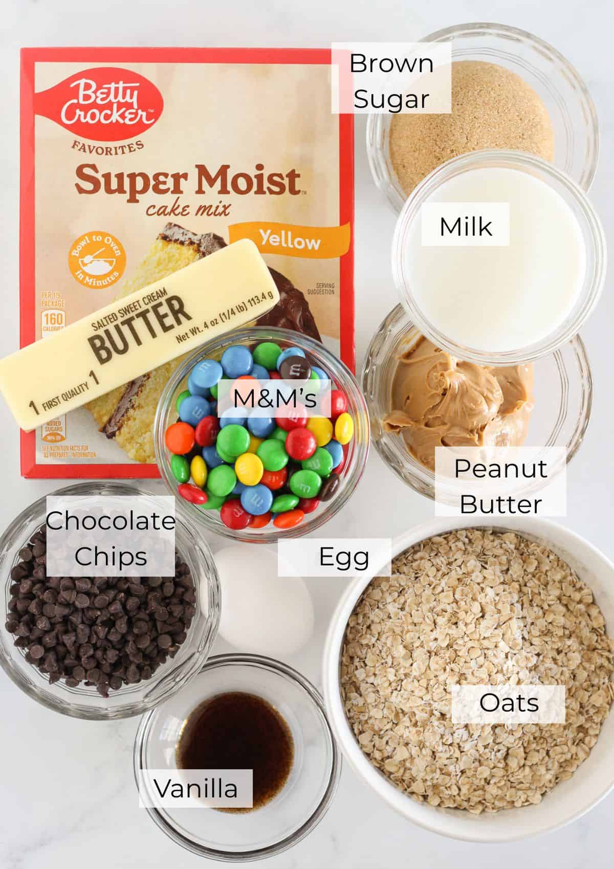 The ingredients needed to make Monster Cookie Bars with a cake mix.