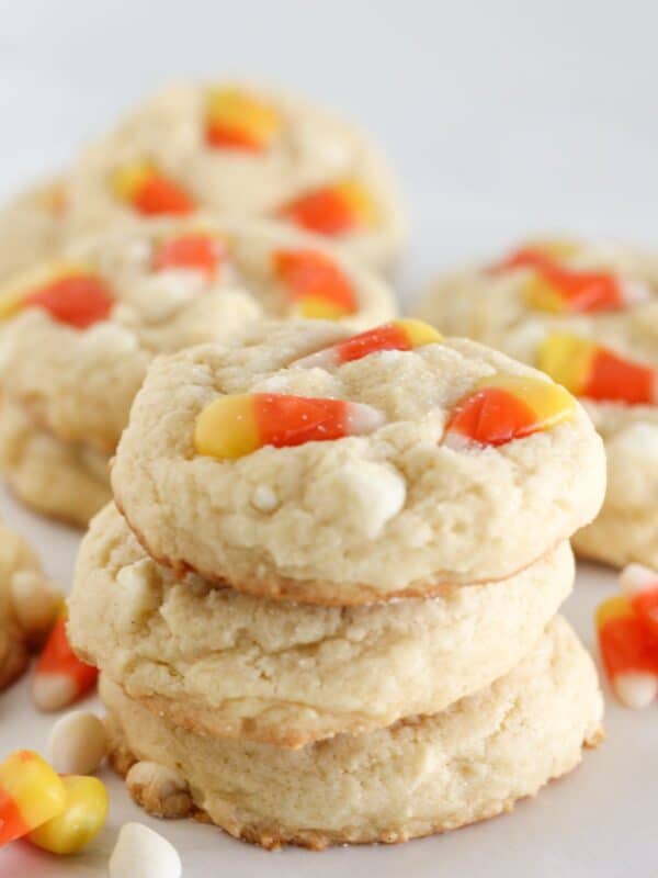 Candy corn sugar cookies stacked on each other.