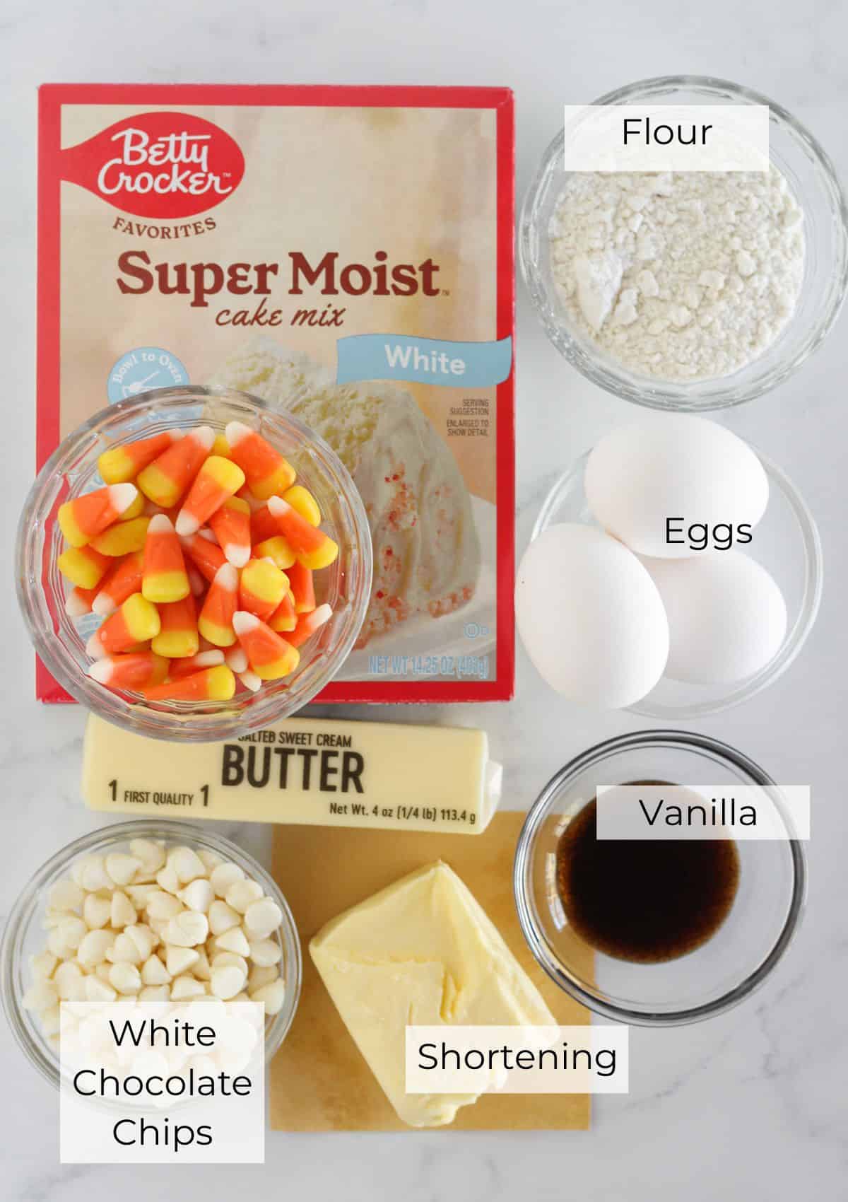 The ingredients needed for making candy corn sugar cookies.