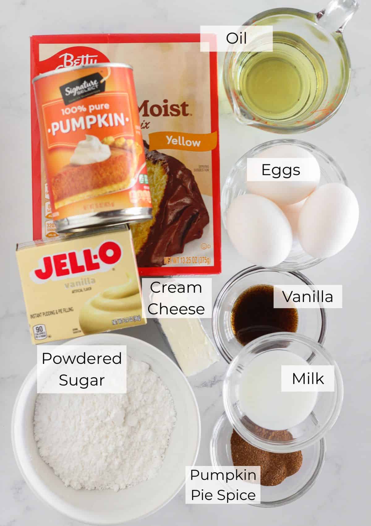 The ingredients needed for a pumpkin spice bundt cake.