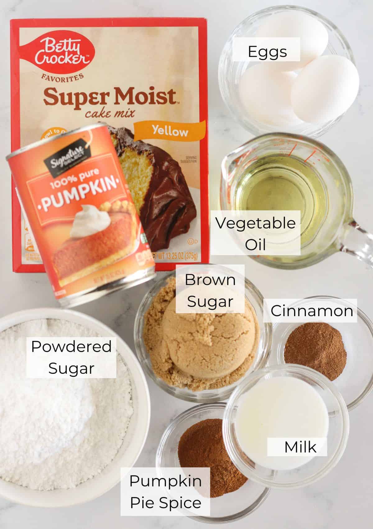 The ingredients needed to make Pumpkin Cinnamon Roll Cake.