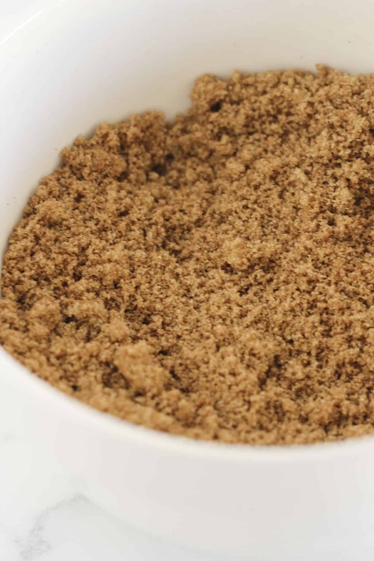 Combining brown sugar and cinnamon for the cinnamon swirl layer.