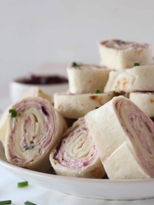 Saucy Turkey Pinwheel Recipe featured by top US food blog, Practically Homemade