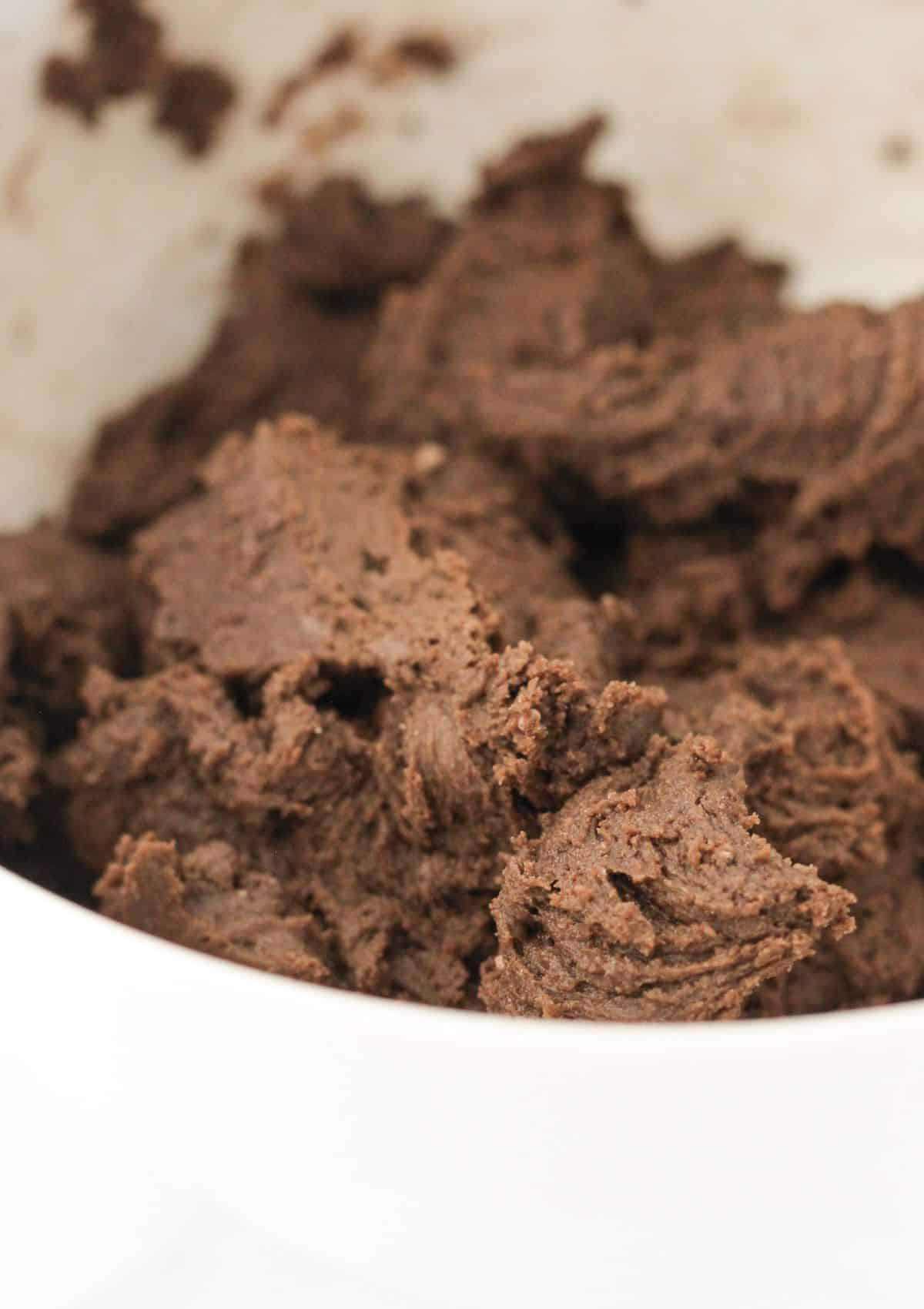 Chocolate cookie dough in a bowl.