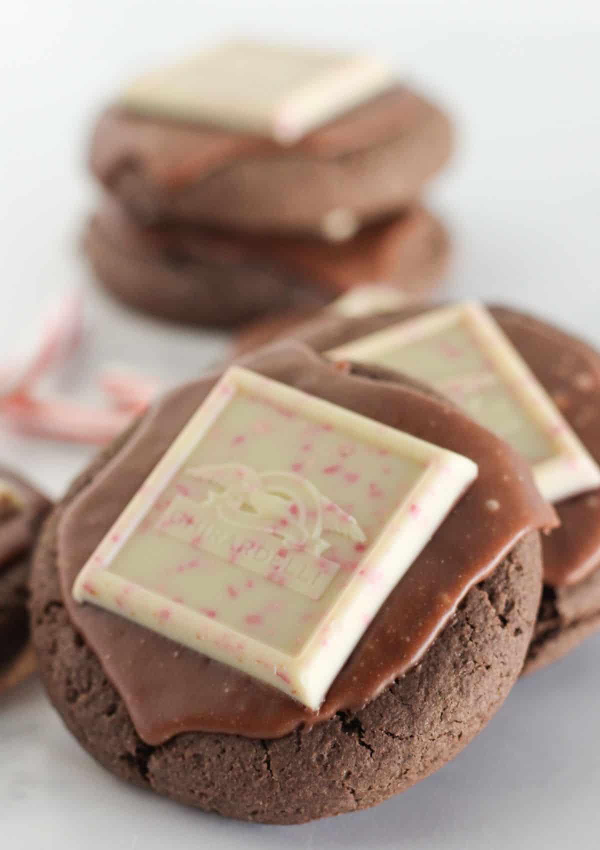 Chocolate peppermint cookies stacked on each other.