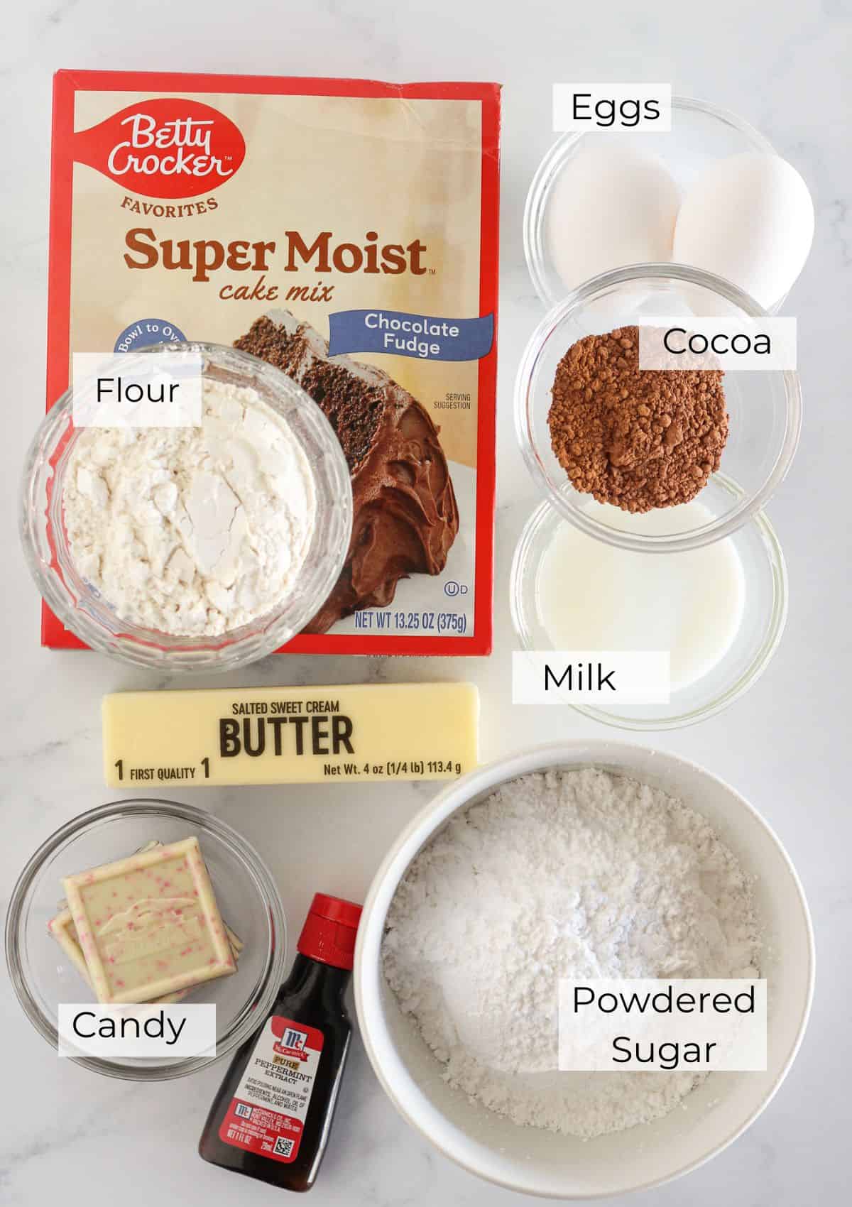 The ingredients needed to make chocolate peppermint cookies.