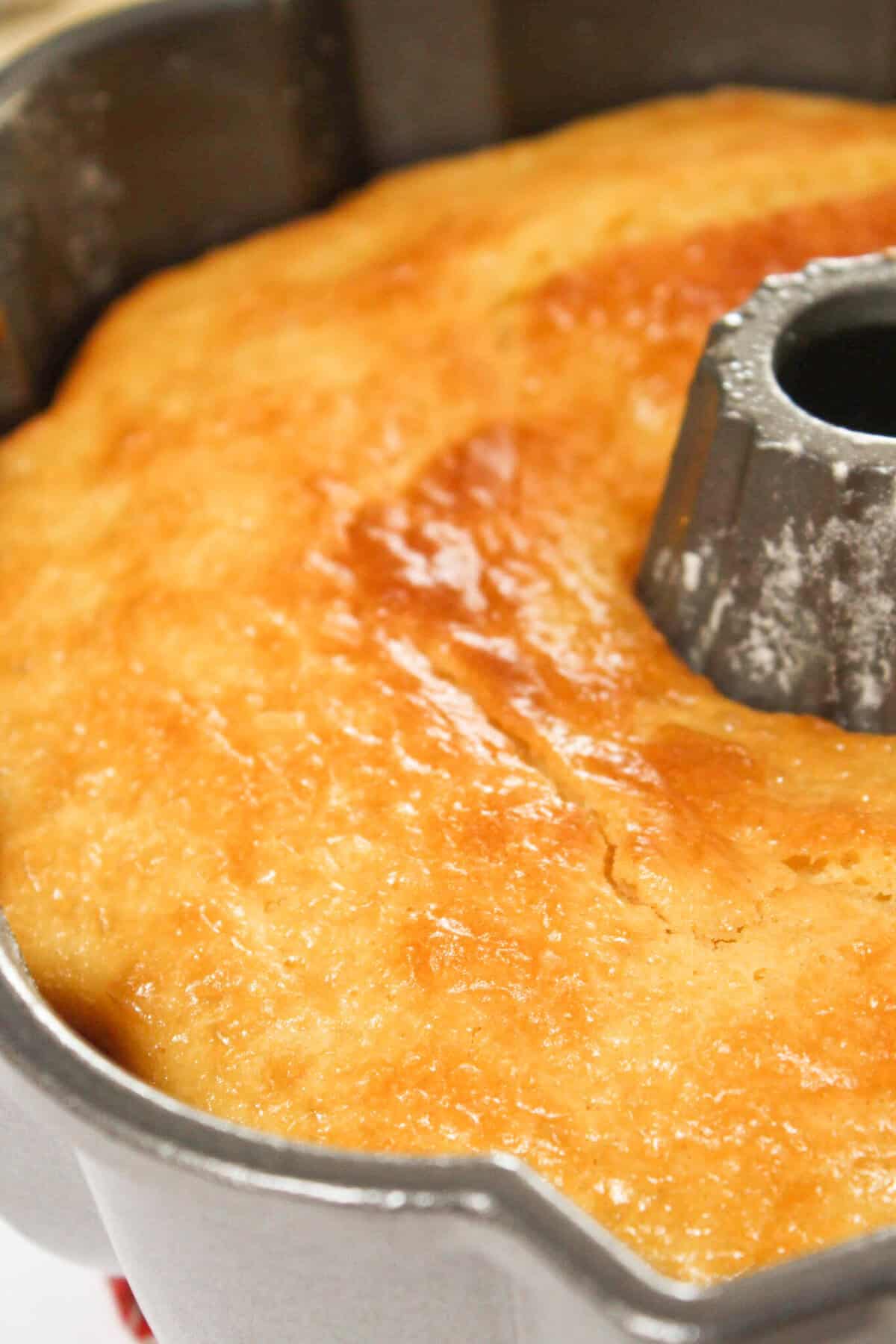 Baking the cake until it is golden brown.