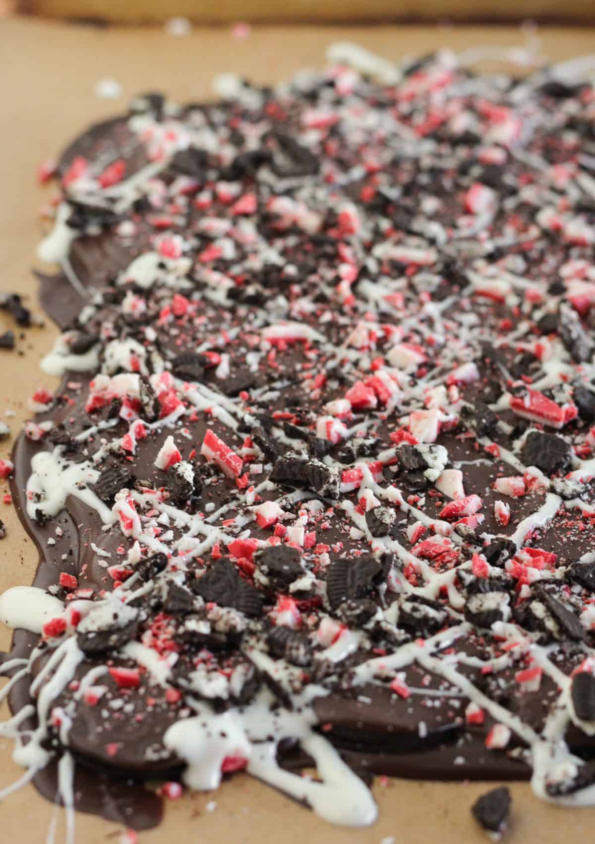 Drizzling with white chocolate, cookie pieces and more peppermint.