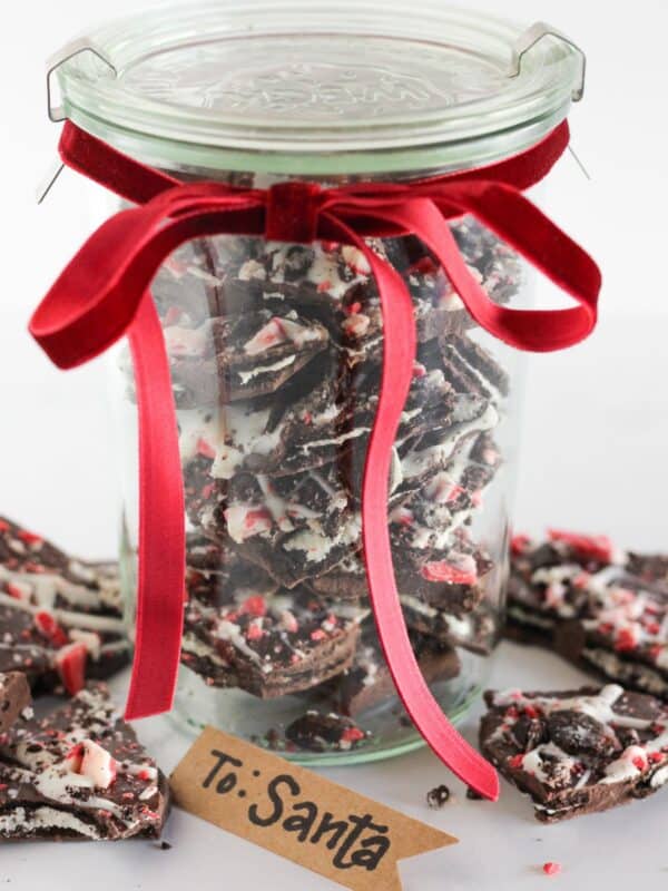 Oreo peppermint bark in a jar and ready to gift.