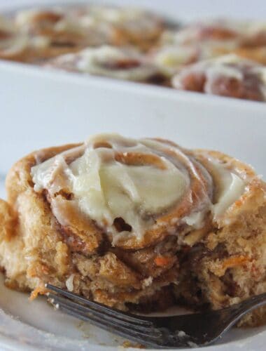 Easy Carrot Cake Mix Cinnamon Rolls with Cream Cheese Frosting Recipe featured by top US dessert blog, Practically Homemade.