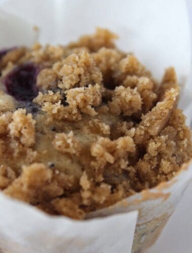Blueberry Poppy Seed Crumb Muffins recipe featured by top US dessert blog, Practically Homemade
