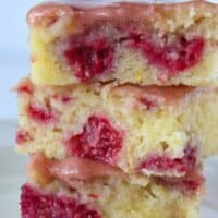 Raspberry Lemonade Bars Recipe featured by top US dessert blog, Practically Homemade