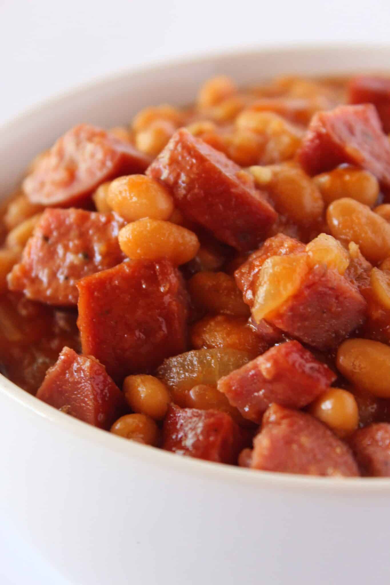 BBQ Side Dish: Smoked Sausage Baked Beans Recipe featured by top US food blogger, Practically Homemade