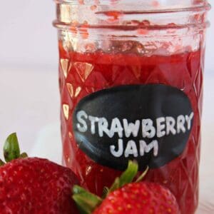 Quick and Easy No Pectin Strawberry Jam featured by top US food blogger, Practically Homemade
