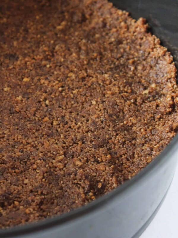 Chocolate Chip Cookie Cheesecake Crust Recipe featured by top US dessert blogger, Practically Homemade