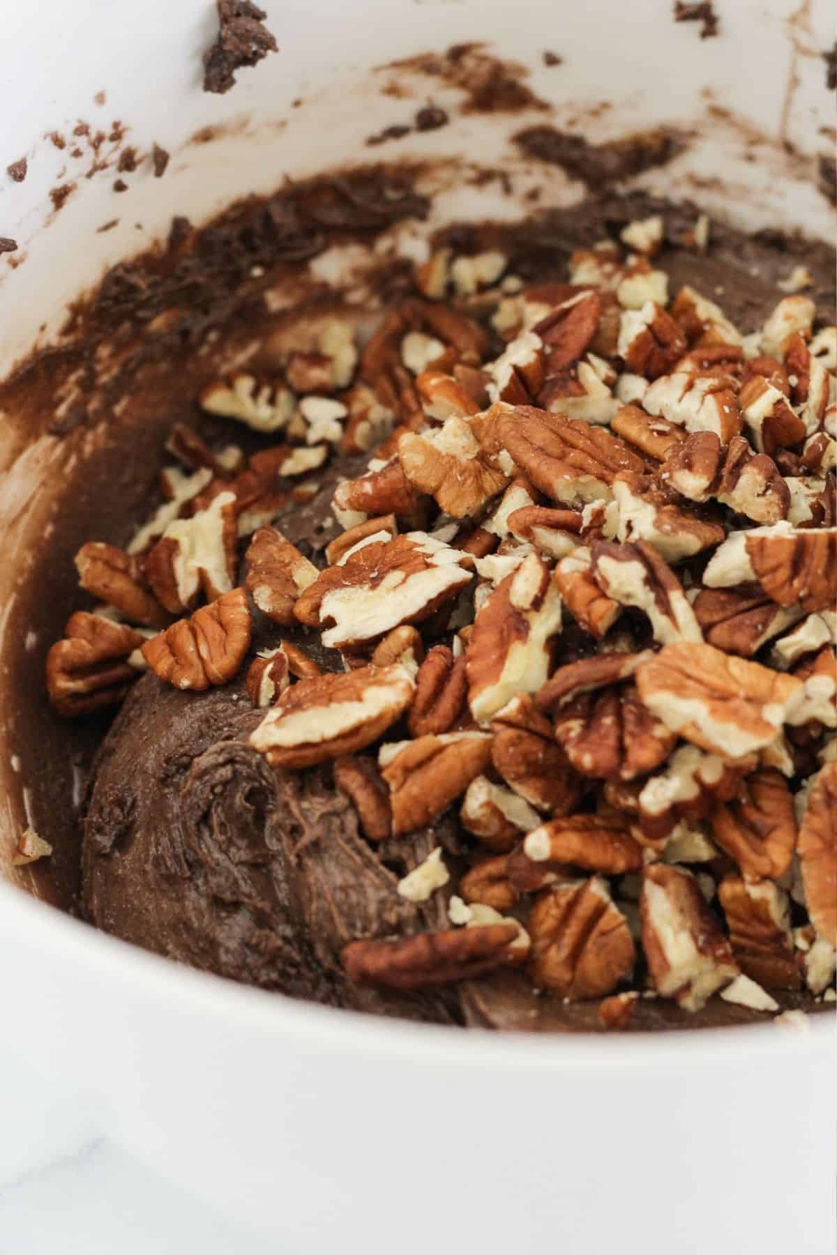 Chocolate cake mix cookie dough with pecans.
