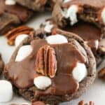 Mississippi Mud Cookies made with a cake mix and topped with a whole pecan.