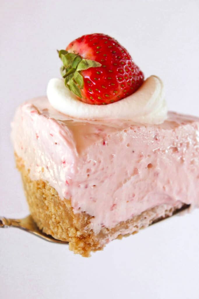 Easy No Bake Strawberry Cheesecake featured by top US dessert blogger, Practically Homemade