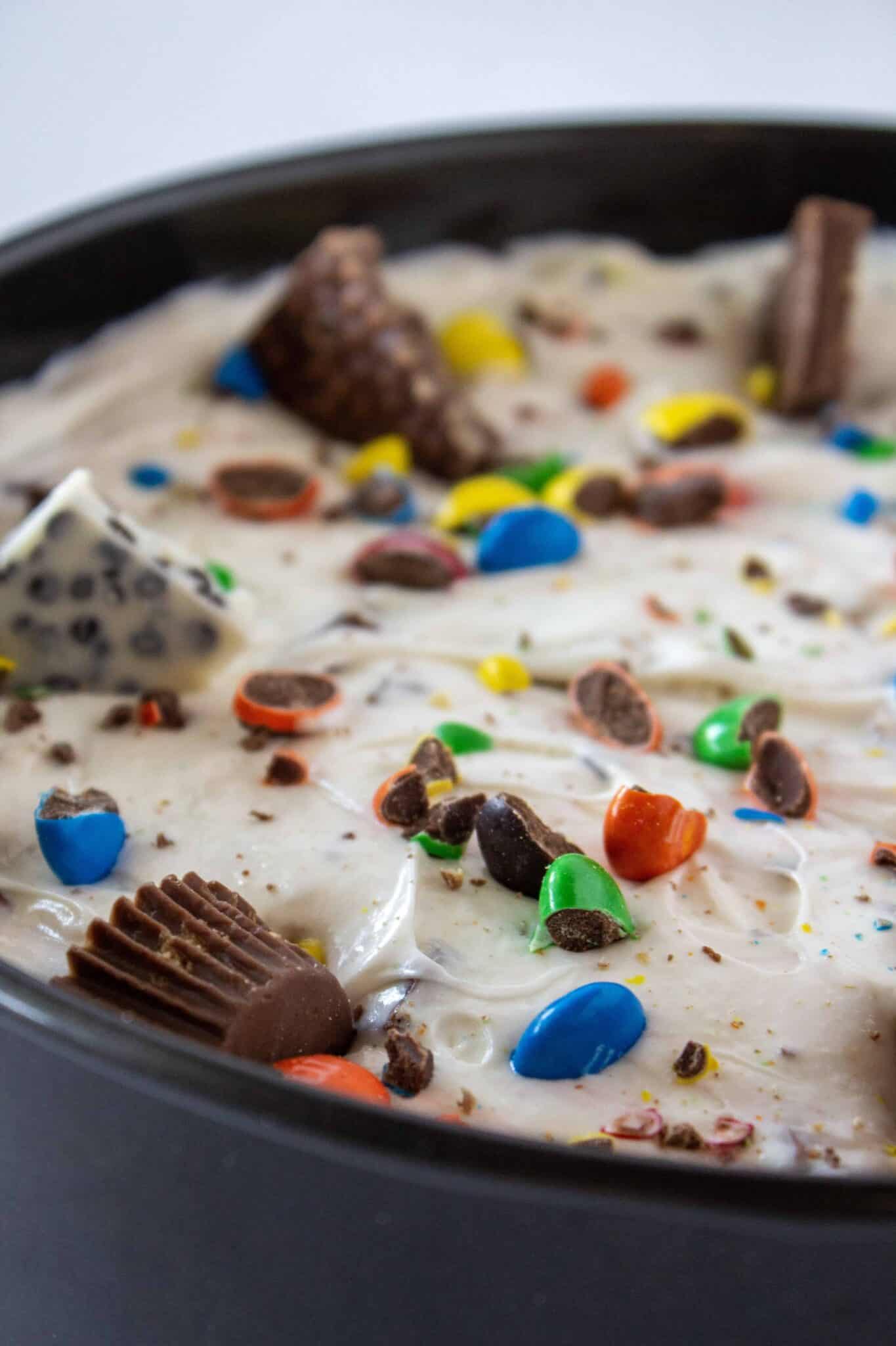 No Bake Halloween Candy Cheesecake Recipe featured by top US dessert blogger, Practically Homemade