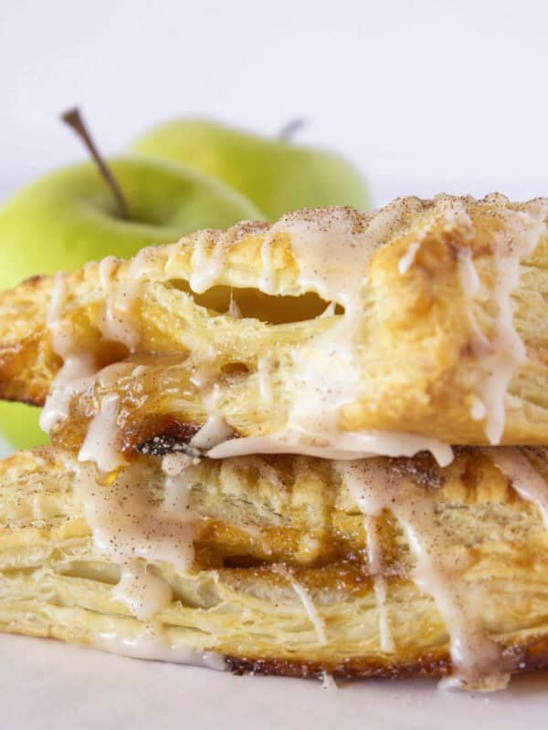 Two caramel apple turnovers stacked on each other.