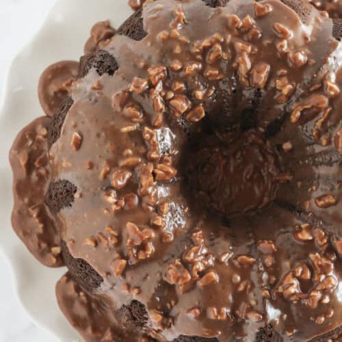 A finished Texas Sheet Cake Bundt Cake with chocolate pecan frosting.