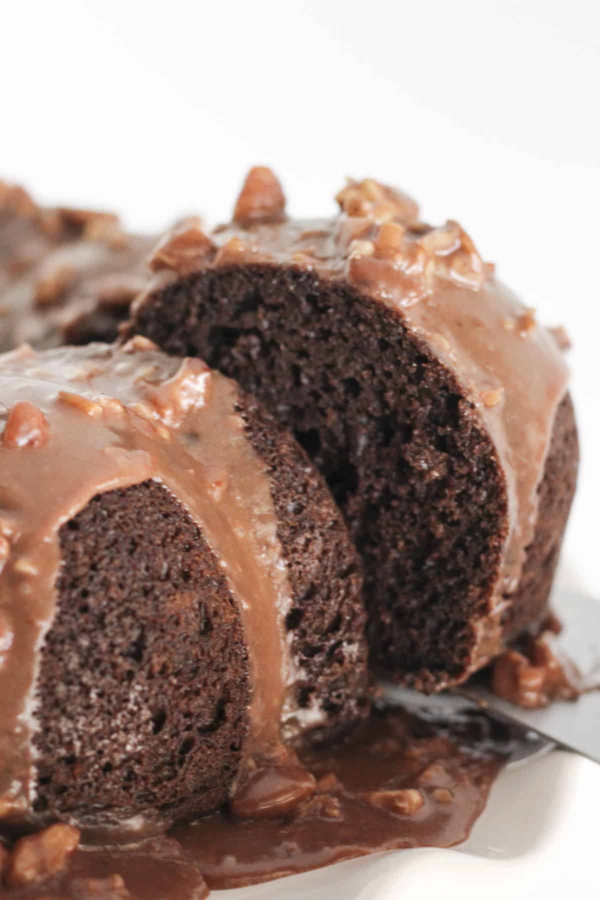 Serving a slice of Texas Sheet Cake Bundt Cake.