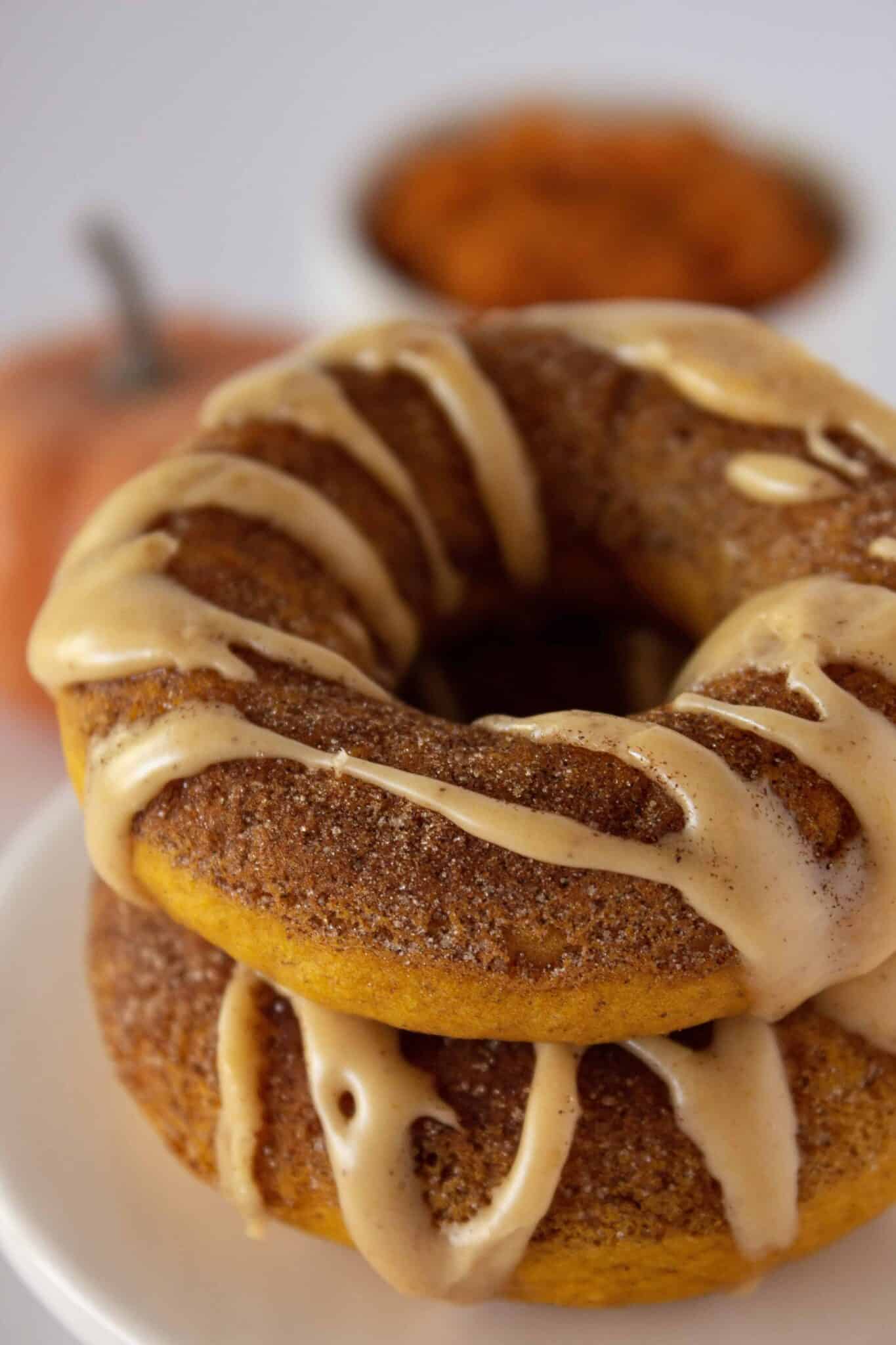 Pumpkin Spice Donuts with Pancake Mix Recipe featured by top US dessert blogger, Practically Homemade.