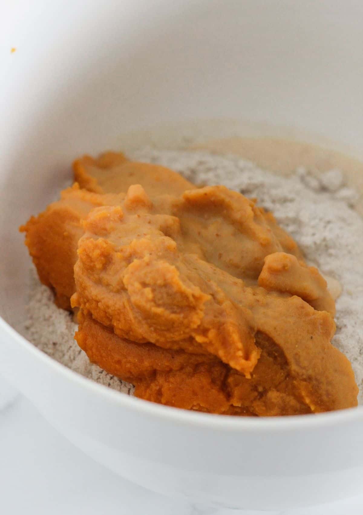 Combining the ingredients in a bowl.