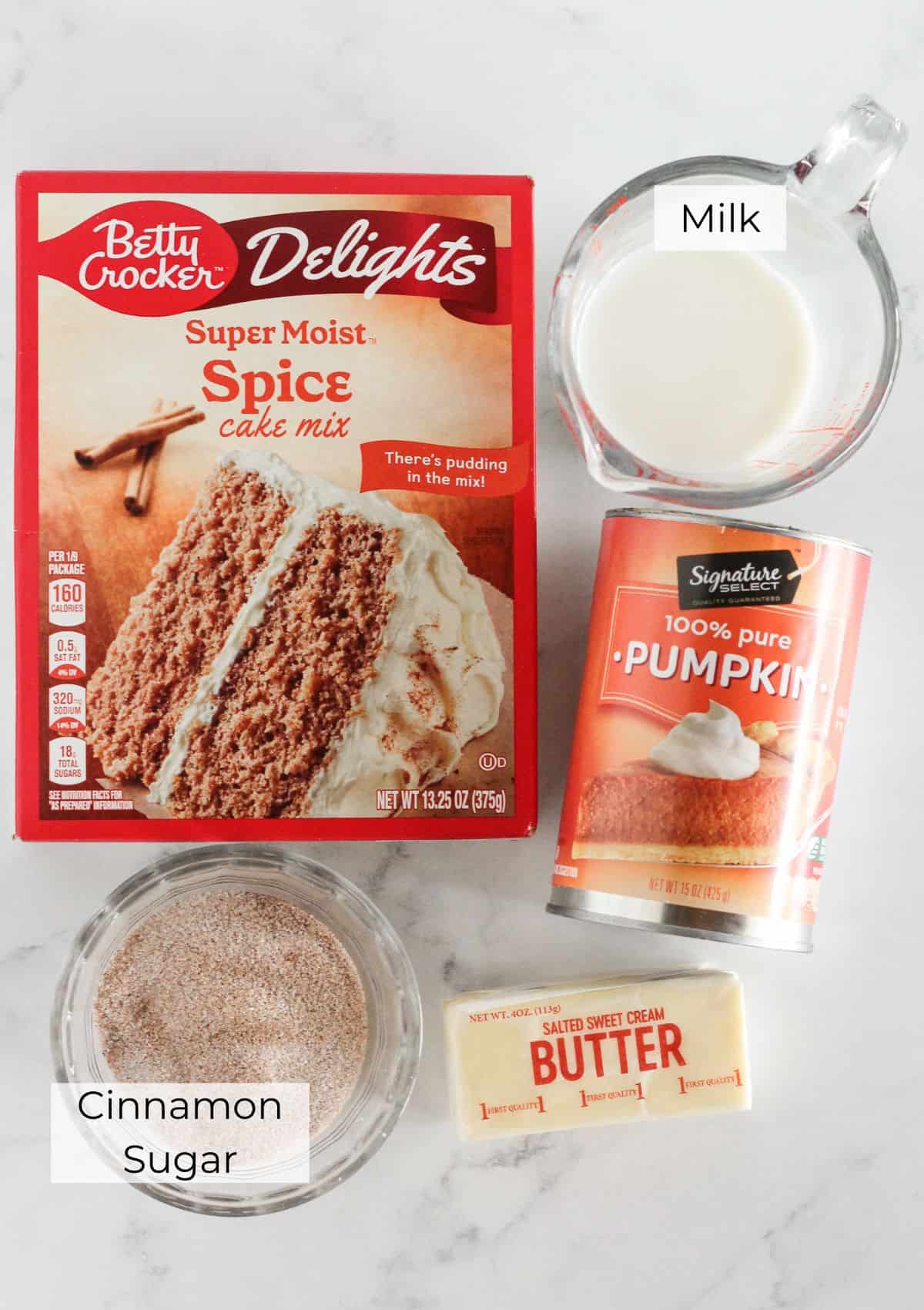 The ingredients needed to make pumpkin spice donuts.