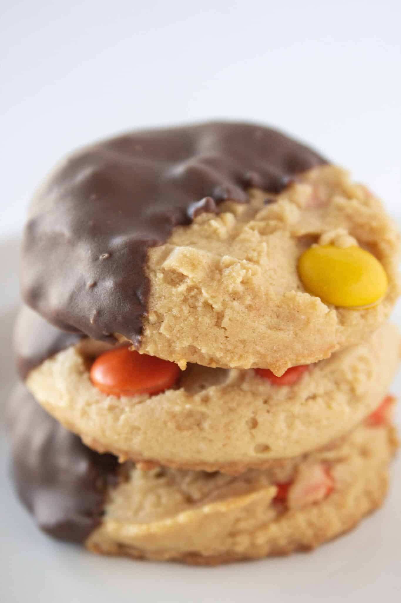 Reese's Pieces Peanut Butter Cookies Recipe with a Cake Mix and Dipped in Chocolate featured by top US cookies blogger, Practically Homemade